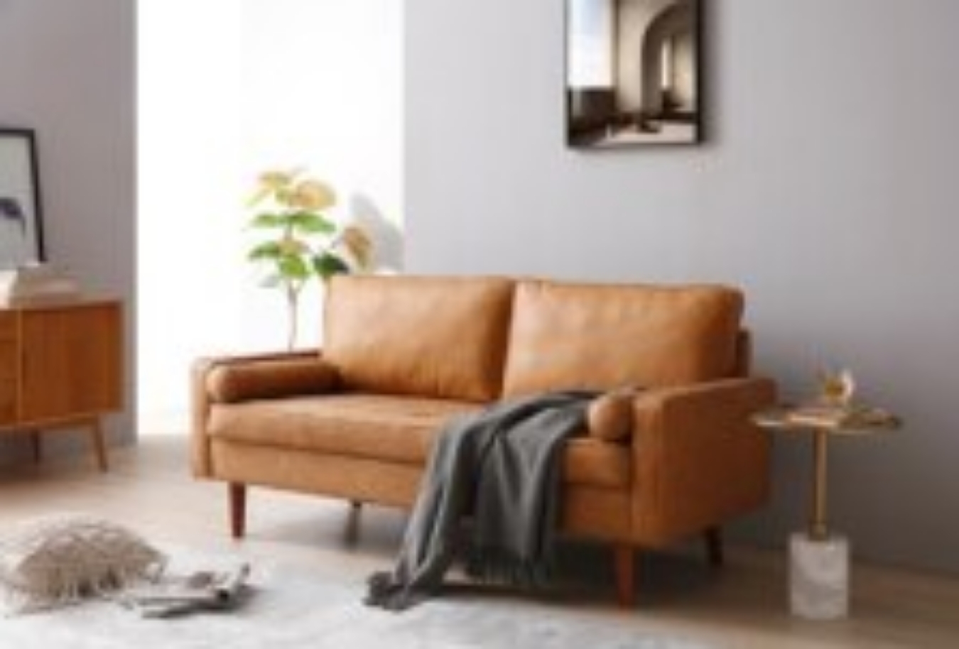 This Coogee 2.5 Seater Faux Leather Sofa - Brown  is a design classic and now you can bring it into your own home with this contemporary take on the retro design. 