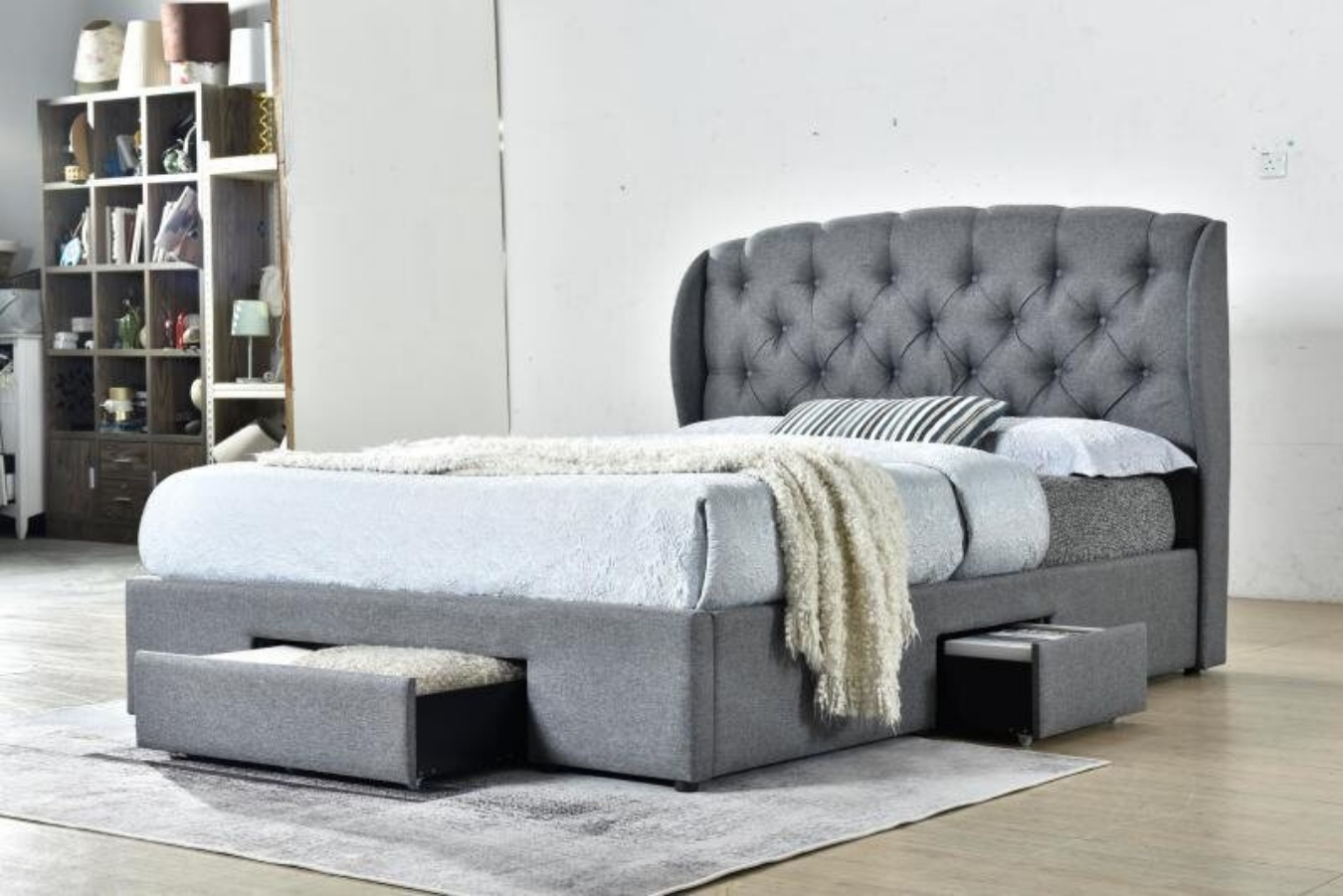 Simply stunning with button tufting and wing detail, with HENRY DOUBLE BED WITH DRAWERS