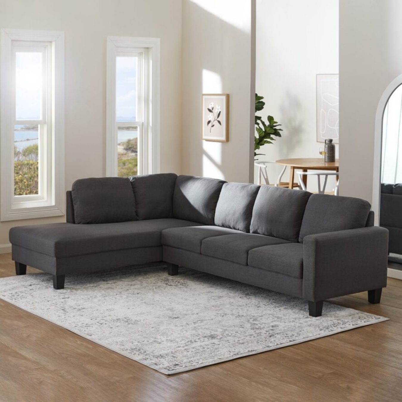 For a living room with stylish, comfortable, and spacious seating, the Evelyn 5 Seater Sofa (L-Shape, Chaise on left) will meet your needs. 